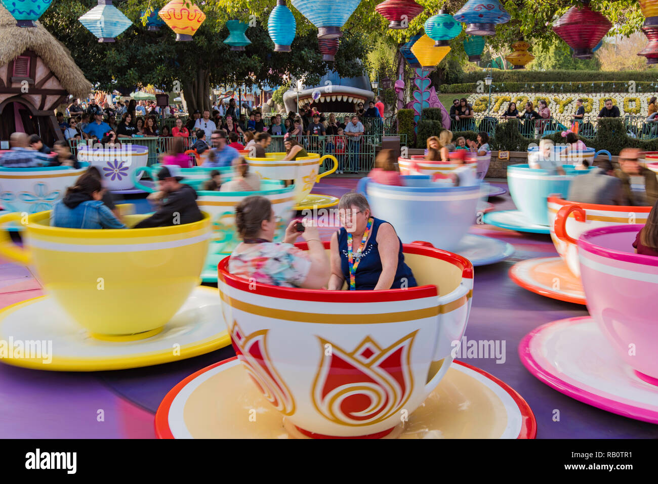 The Cup and Saucer ride with two older women at Disneyland Anaheim, LA