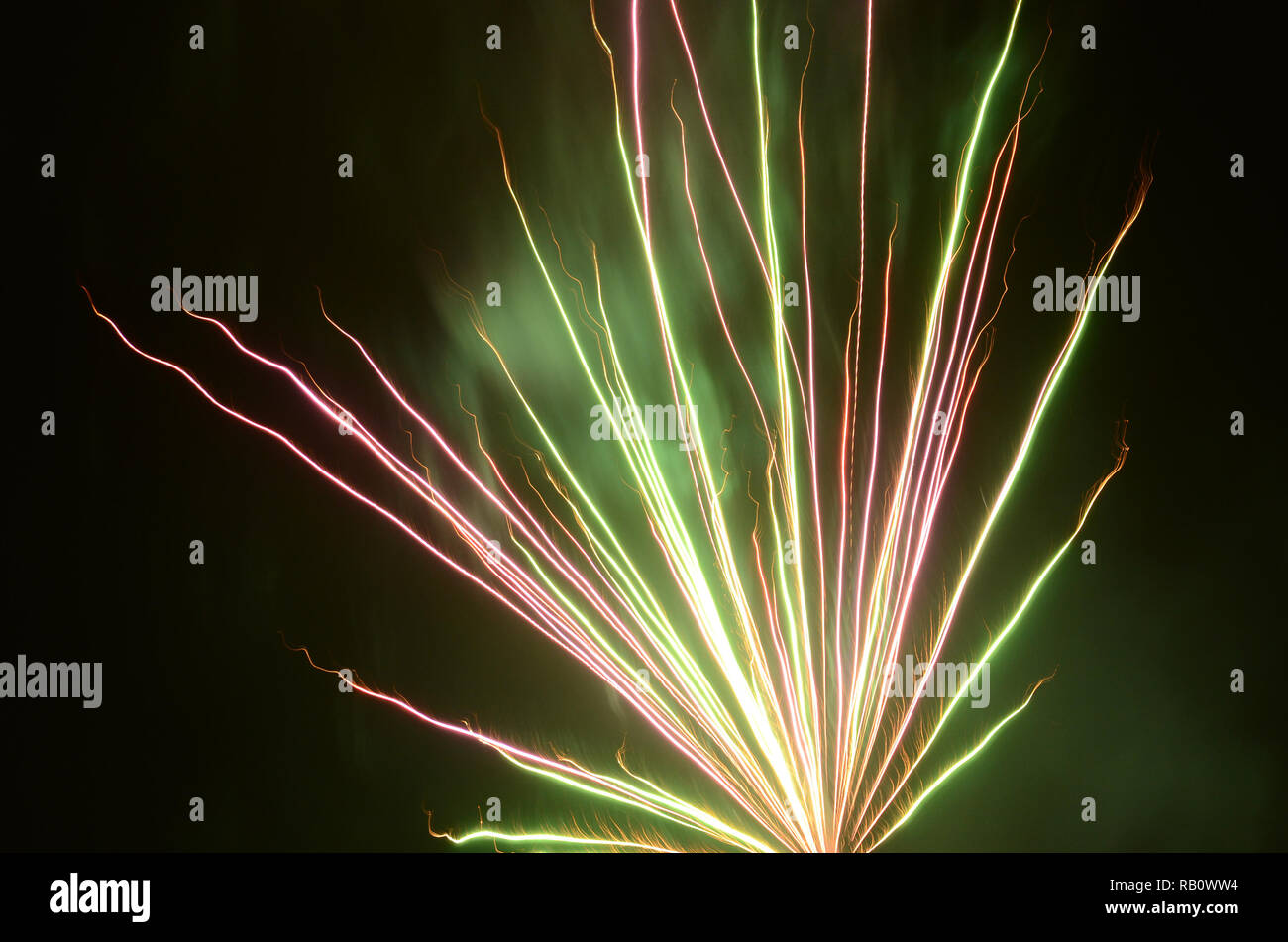Firework flower structure with red and green colors. Stock Photo