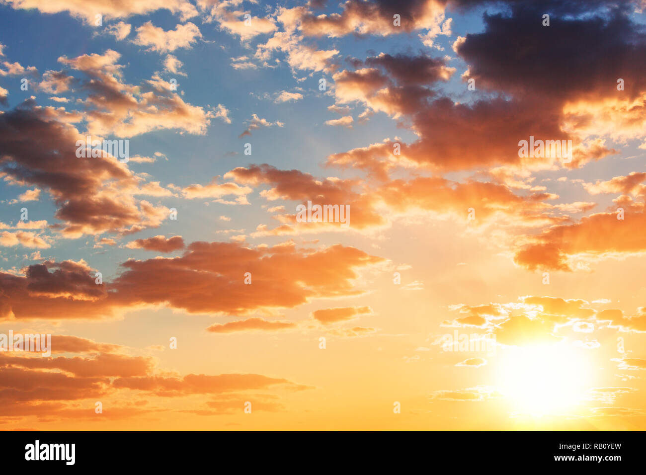 Cloudscape and dramatic blue sky, sunset shot Stock Photo - Alamy