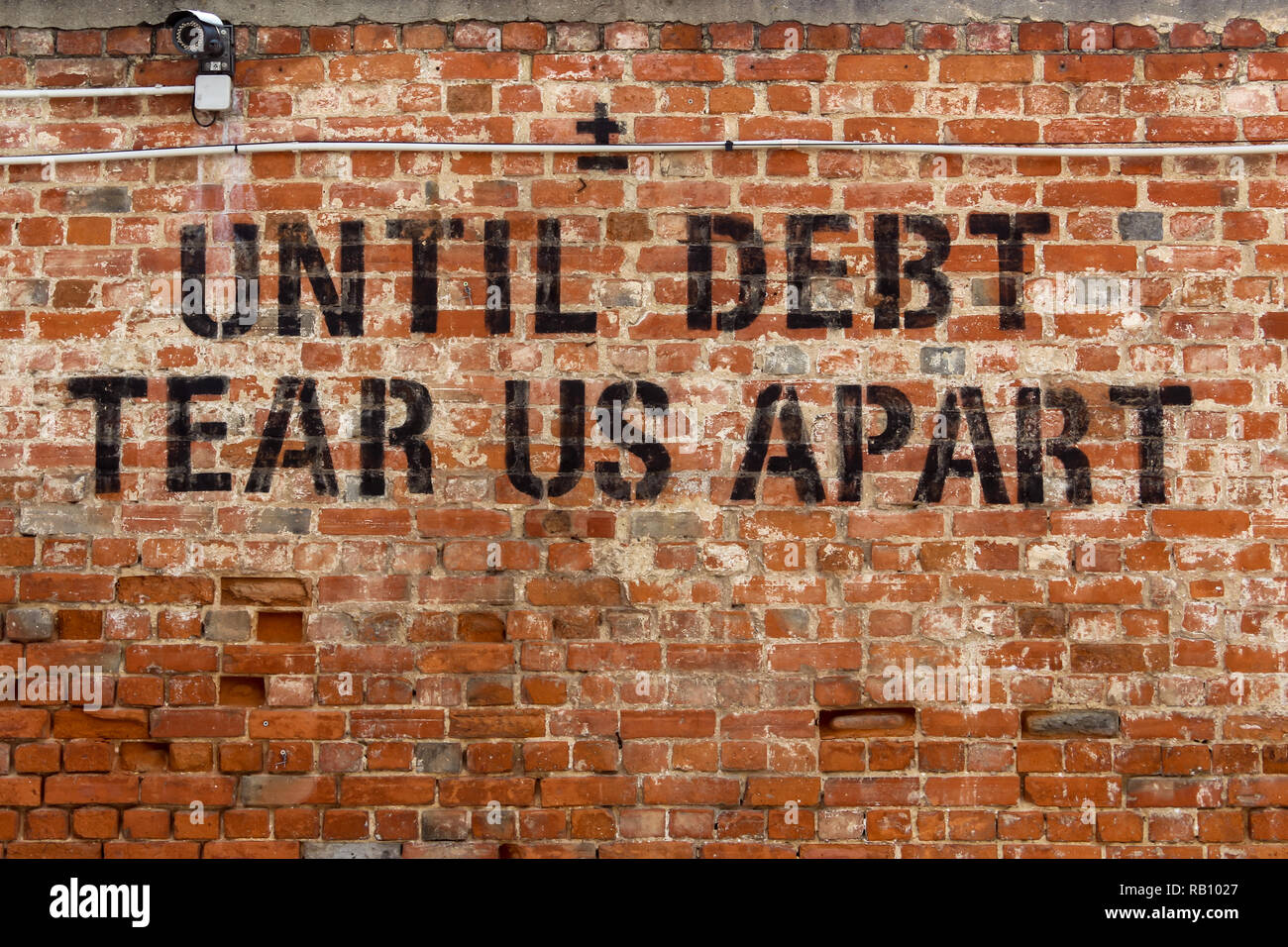 Graffiti on Wall / Until dept tear us apart Stock Photo