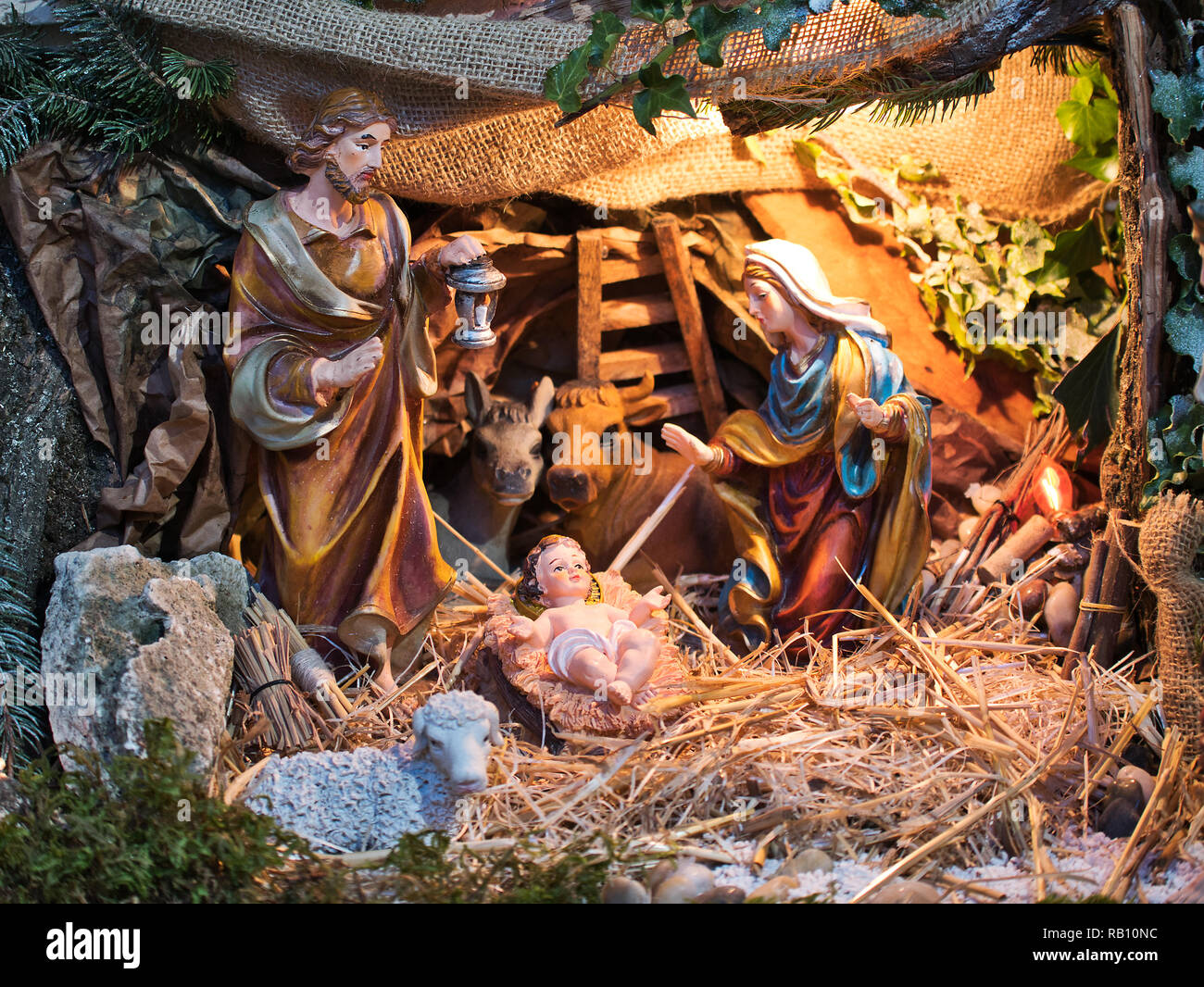 Nativity scene Jesus kid statue close up manger family symbol Stock