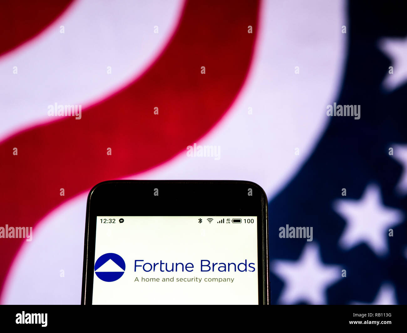Fortune Brands Holding company logo seen displayed on smart phone Stock