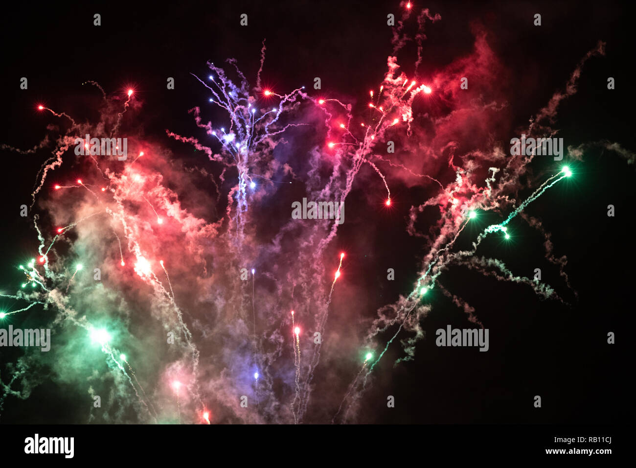 multicoloured fireworks and smoke in sky at Centre Parcs New Year Celebration Stock Photo Alamy