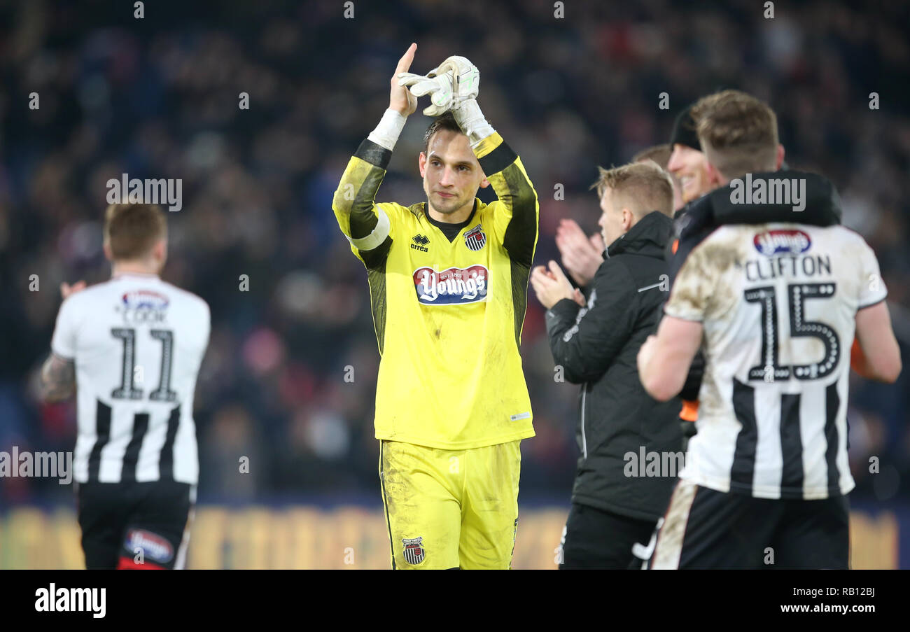 Grimsby Town goalkeeper James McKeown applauds the fans at full time during the Emirates FA Cup, third round match at Selhurst Park, London. Stock Photo