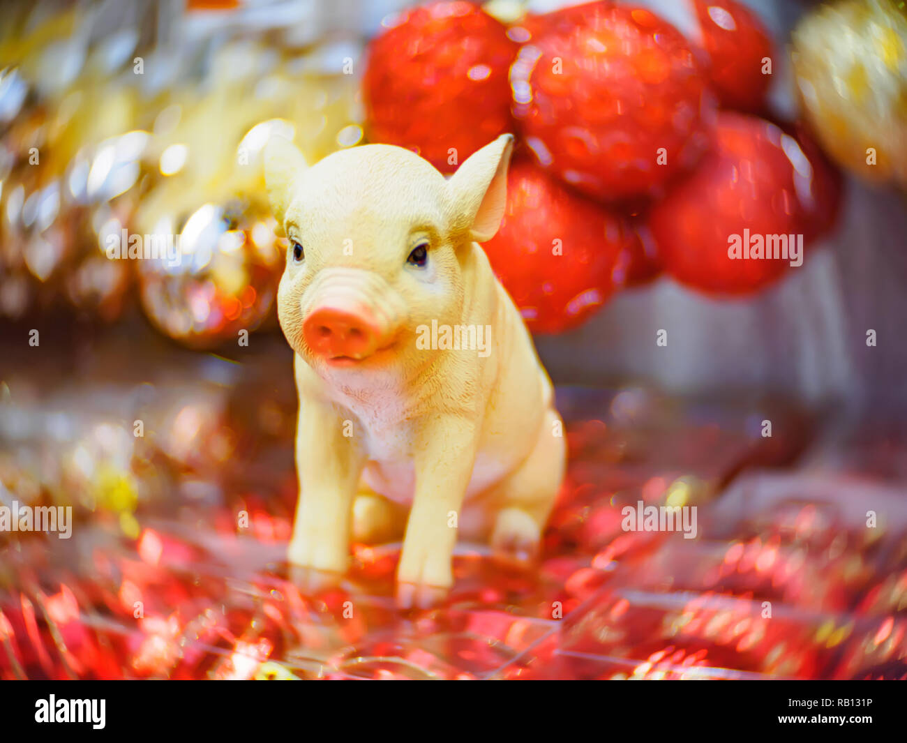 Christmas decorations and toys. Christmas and New Year festive soft-focused background with a pig as a symbol of the new year. Stock Photo