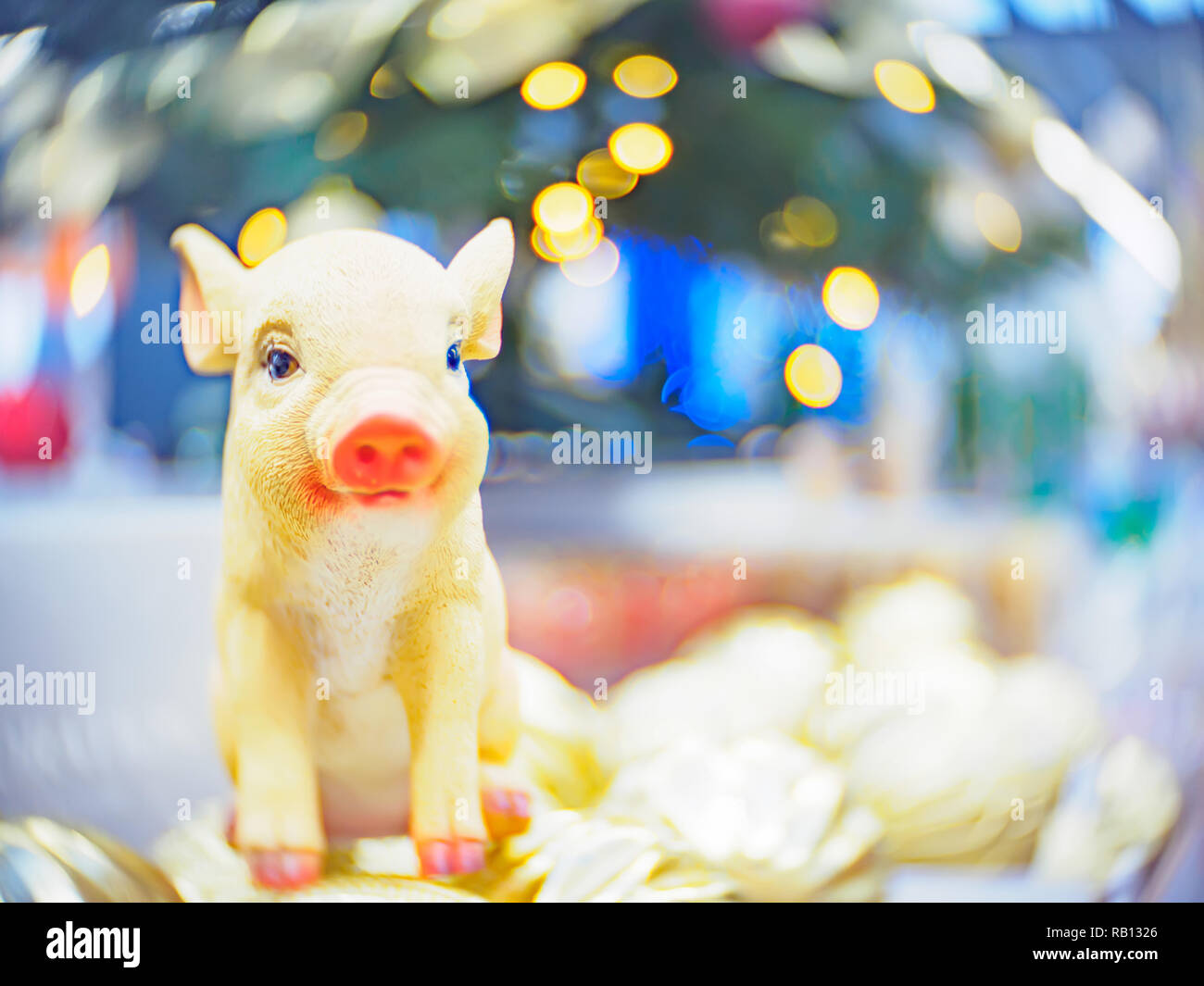 Christmas decorations and toys. Christmas and New Year festive soft-focused background with a pig as a symbol of the new year. Stock Photo