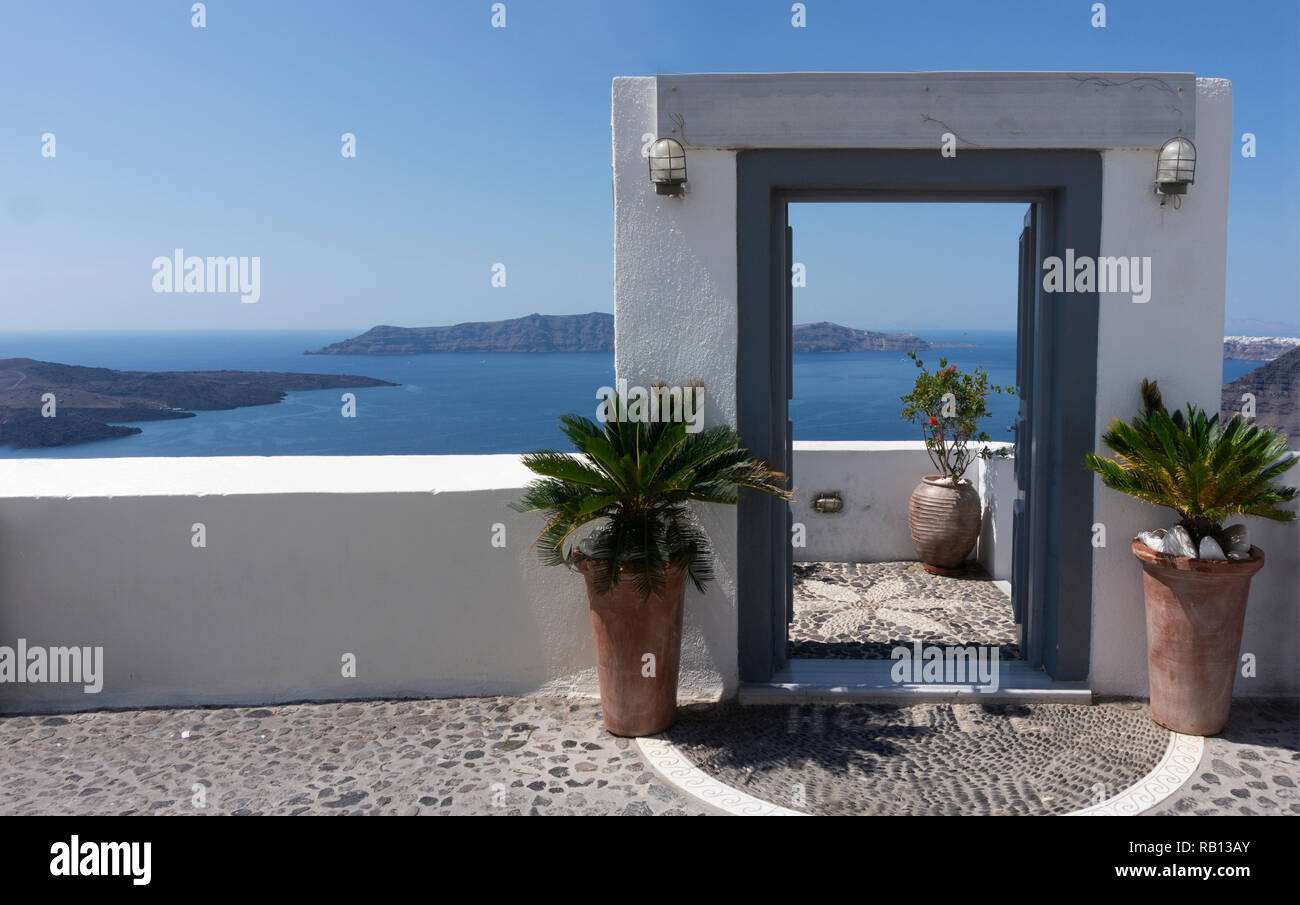 Typical design decoration door of Santorini Greece with way into the sea with copy space Stock Photo