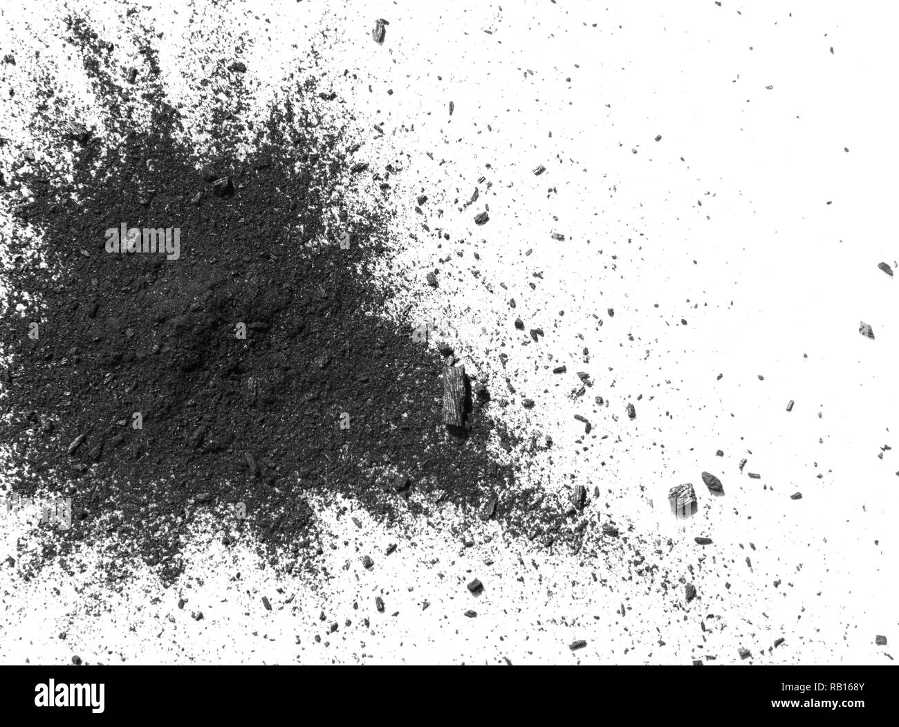 Closeup of black dust particles explode isolated on white background