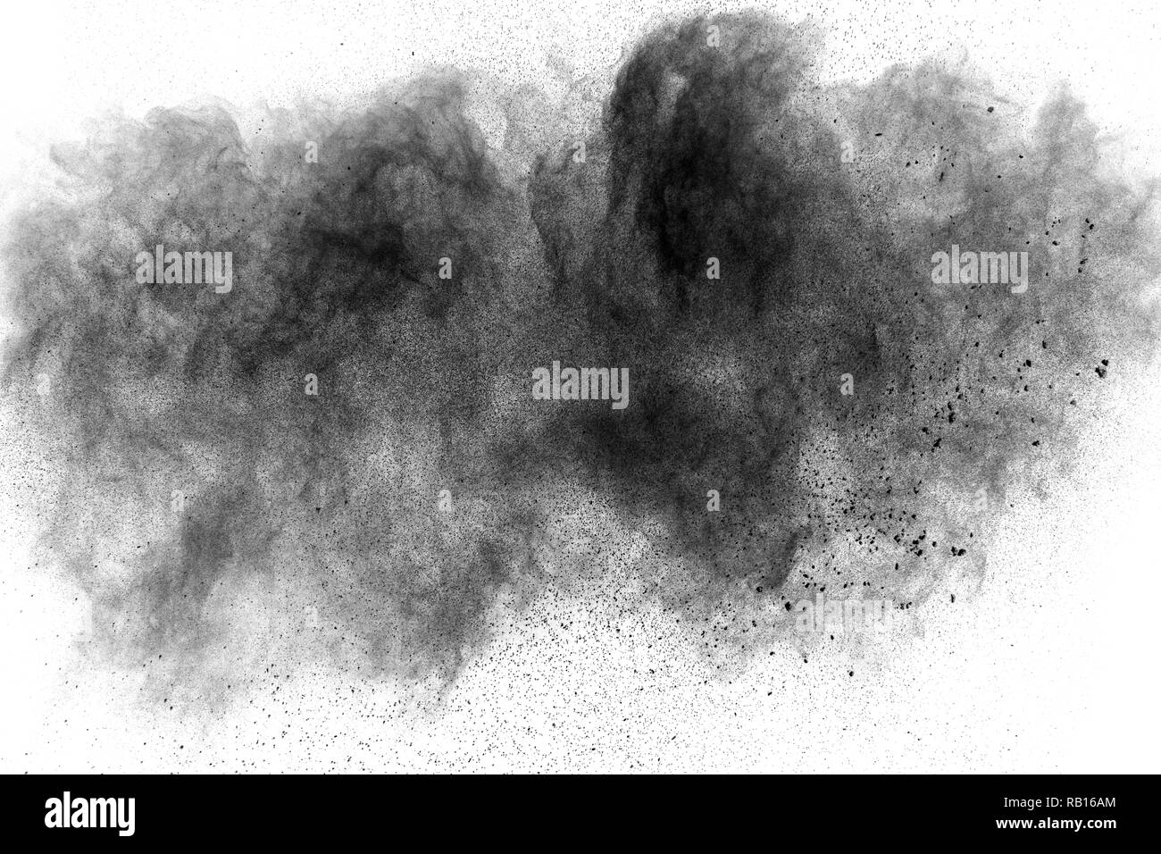 Closeup of black dust particles explode isolated on white background
