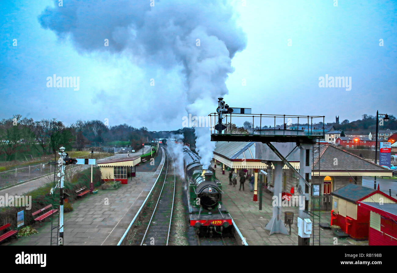 A steam train pulls into Ramsbottom Station, Greater Manchester on the East Lancashire Railway line. Stock Photo