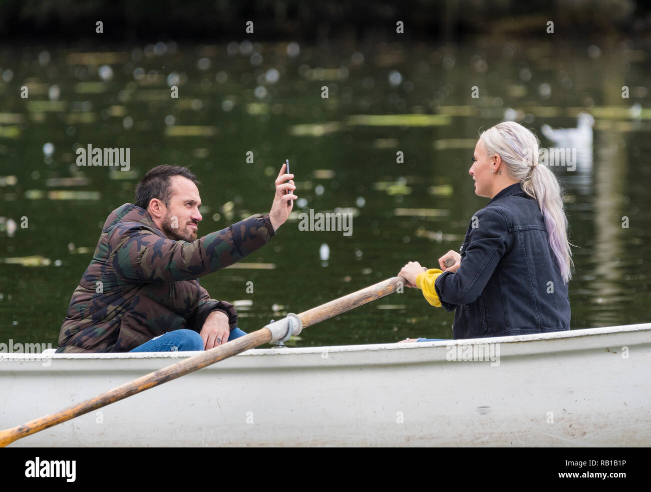 Man and woman rowing boat hires stock photography and images Alamy