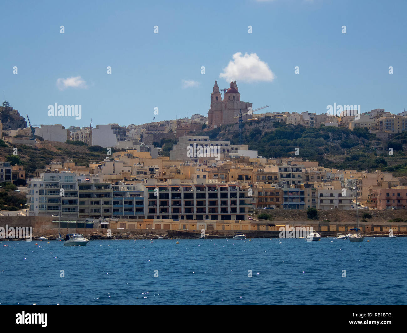 The Parish Church of Mellieha on top of the hill overlooking the town in Malta Stock Photo
