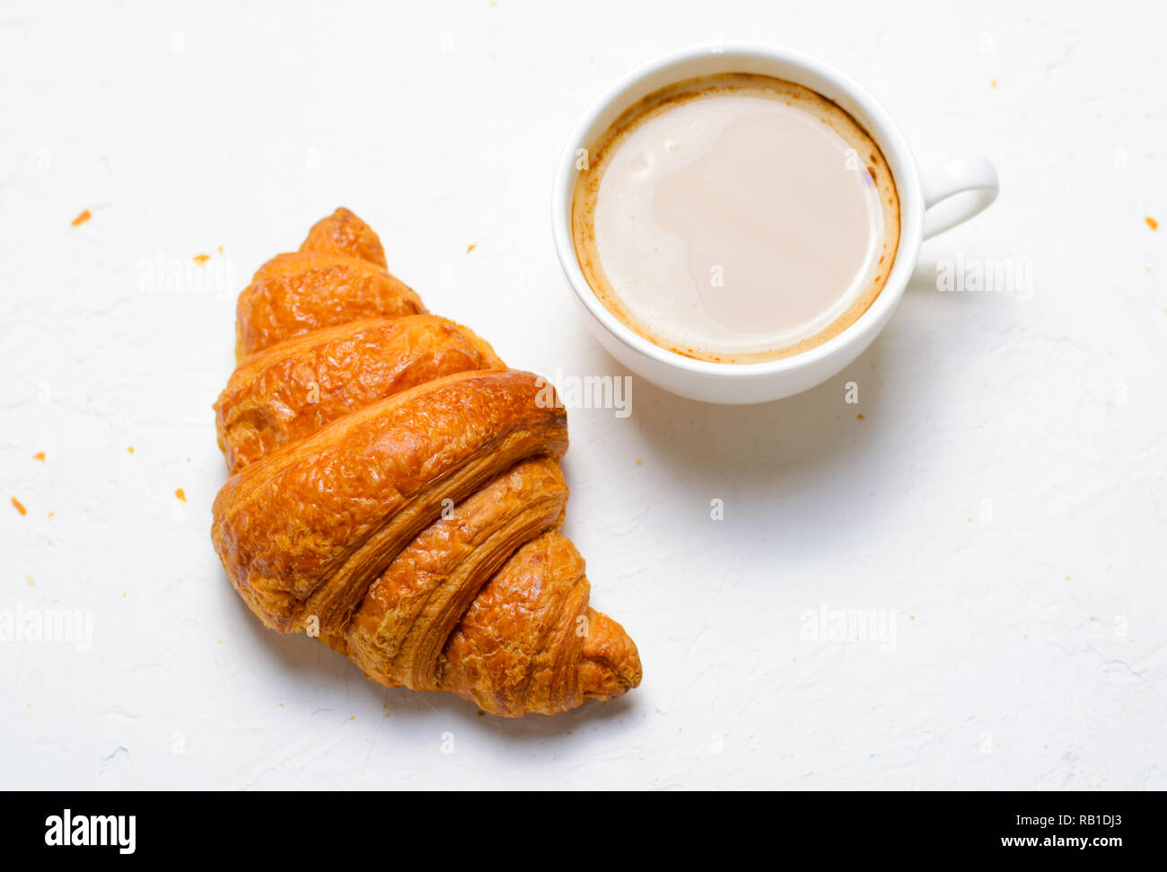 Freshly Baked Croissants and Coffee Cup on White Background Stock Photo