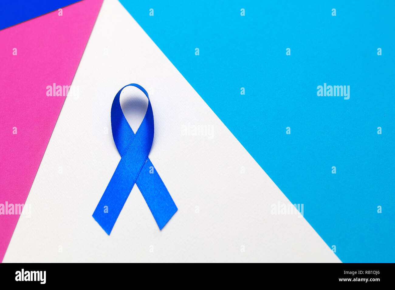 Dark blue ribbon awareness for aids day concept. World cancer day