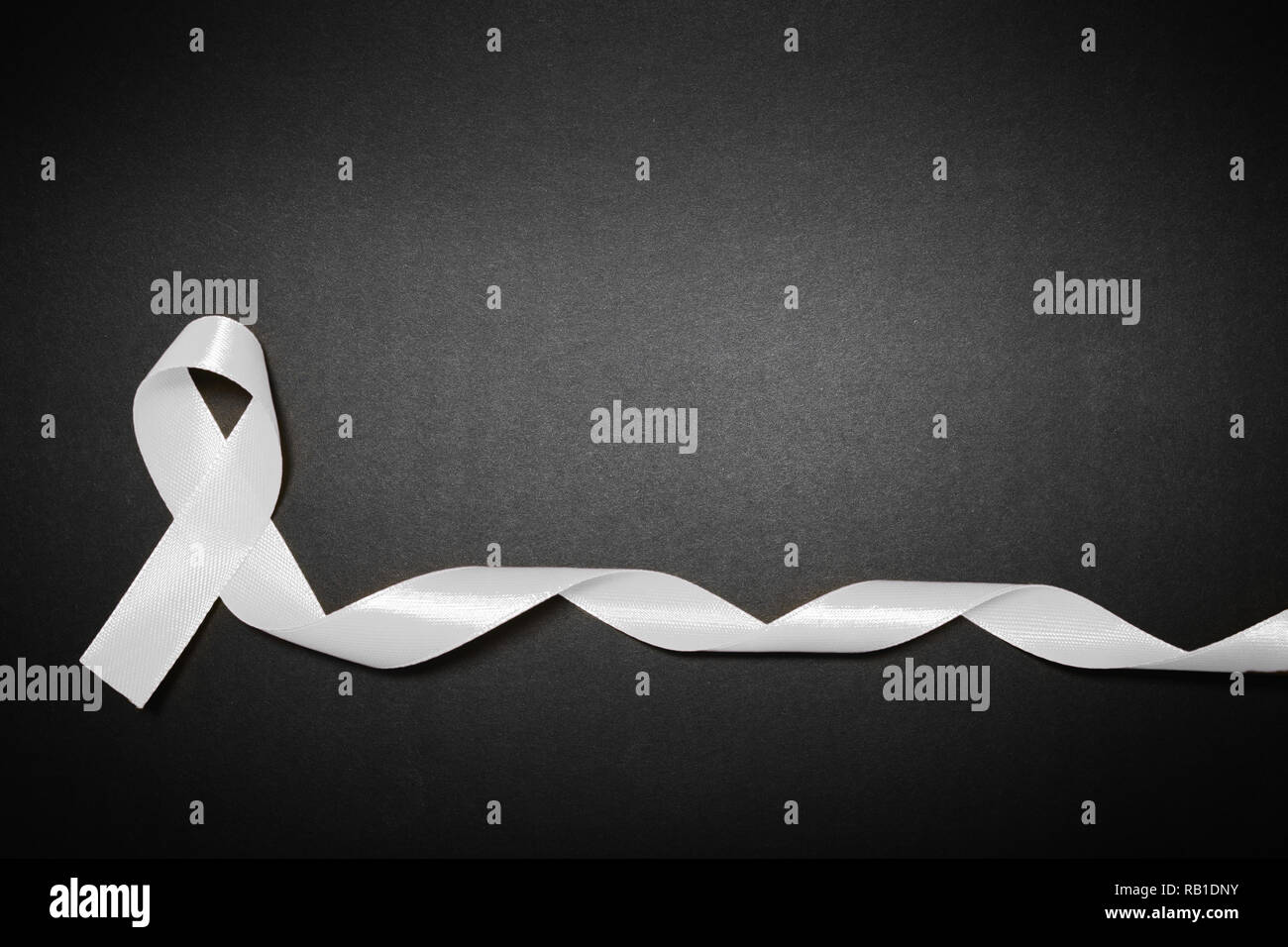 lung cancer ribbon, white ribbon, respiratory cancer control symbol Stock Photo