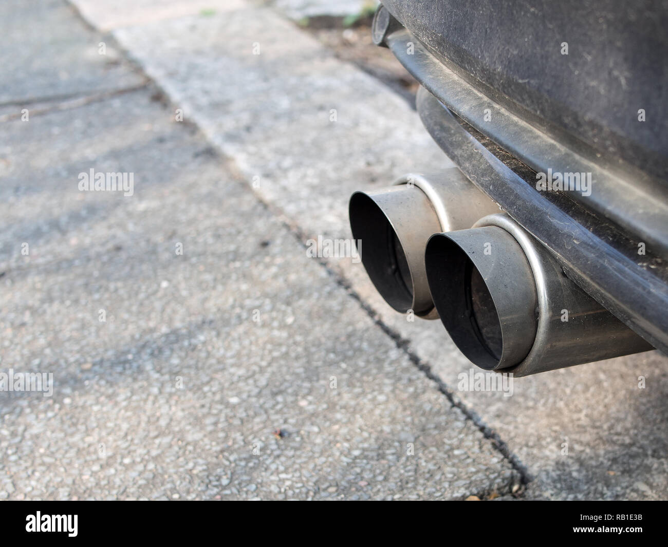 Car Exhaust With Two Tailpipes Selected Focus Stock Photo