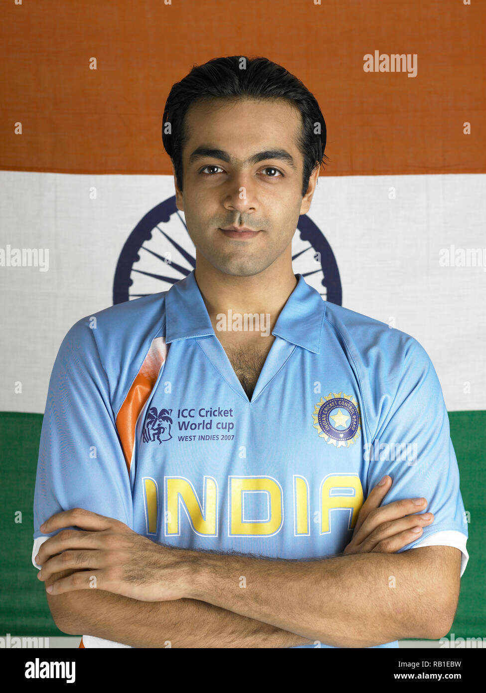 PORTRAIT OF A CRICKET PLAYER WITH THE INDIAN NATIONAL FLAG IN THE BACKGROUND  Stock Photo - Alamy
