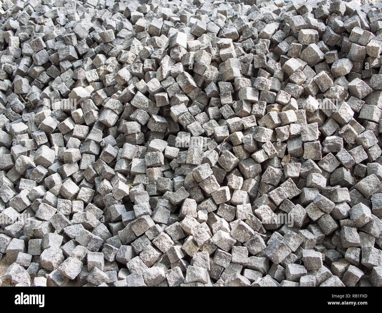 Building Material: Heap of Paving Stones, Background Texture Stock Photo