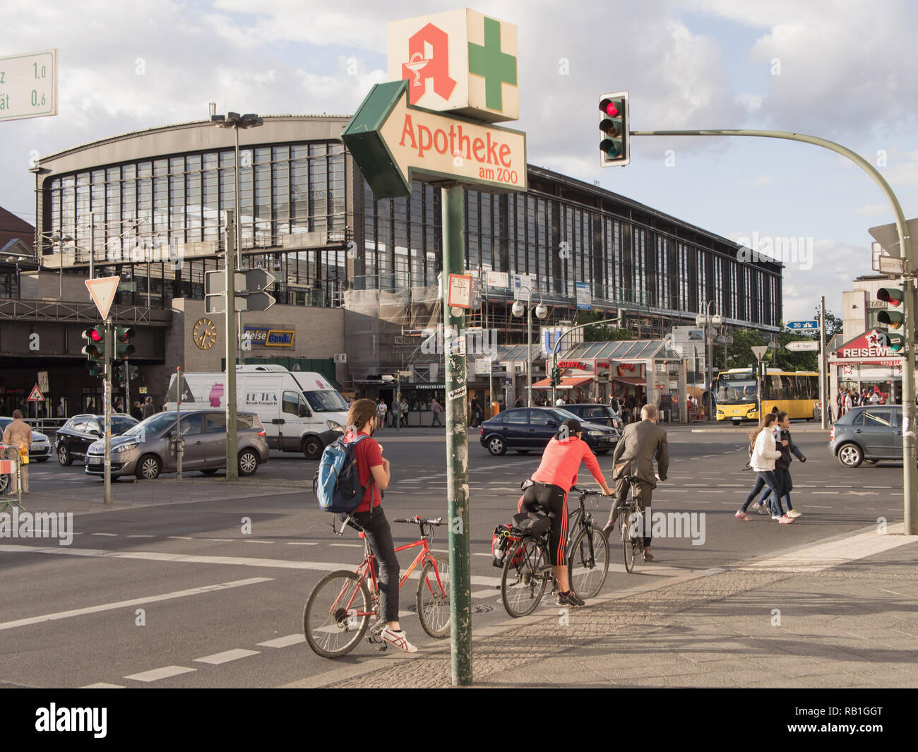 BERLIN, GERMANY - JULY 6, 2016: Bahnhof Zoo, central station with cyclists waiting at traffic lights Stock Photo