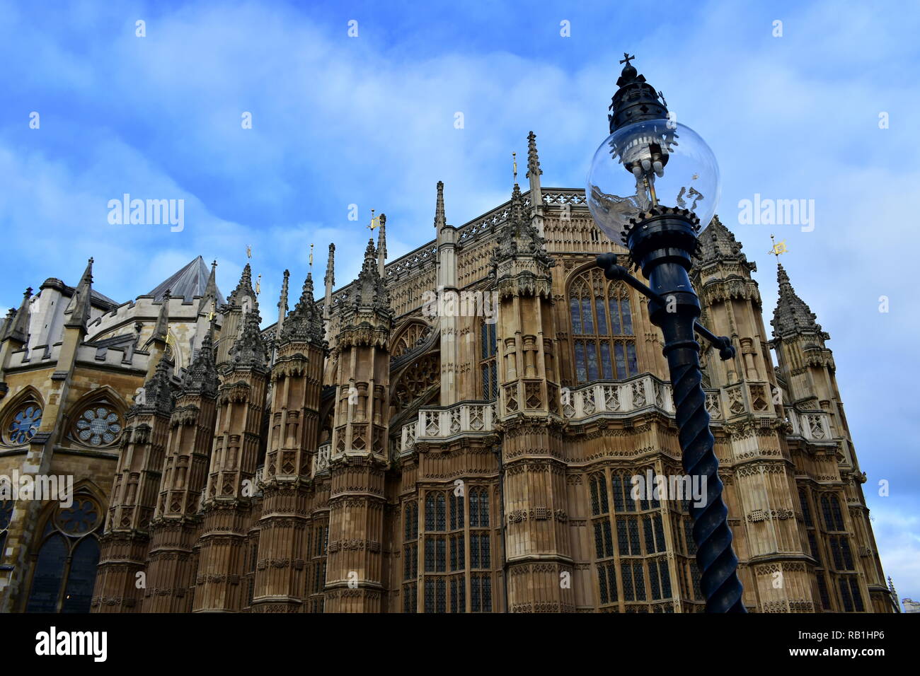 Westminster Abbey with black iron streetlight. London, United Kingdom