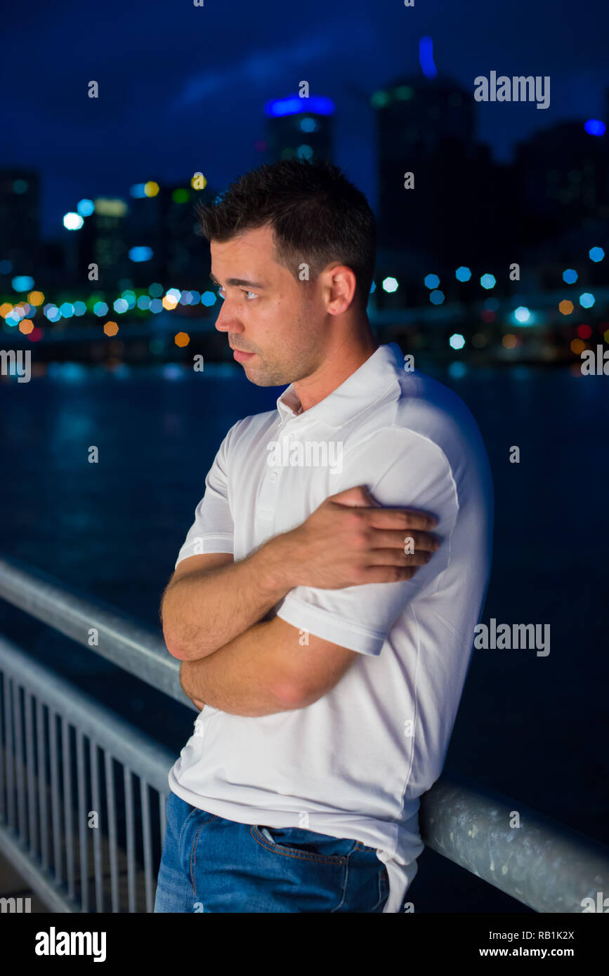 Australian man poses for picture in Brisbane, Australia. Brisbane is one of the Australia's tourist destination points Stock - Alamy