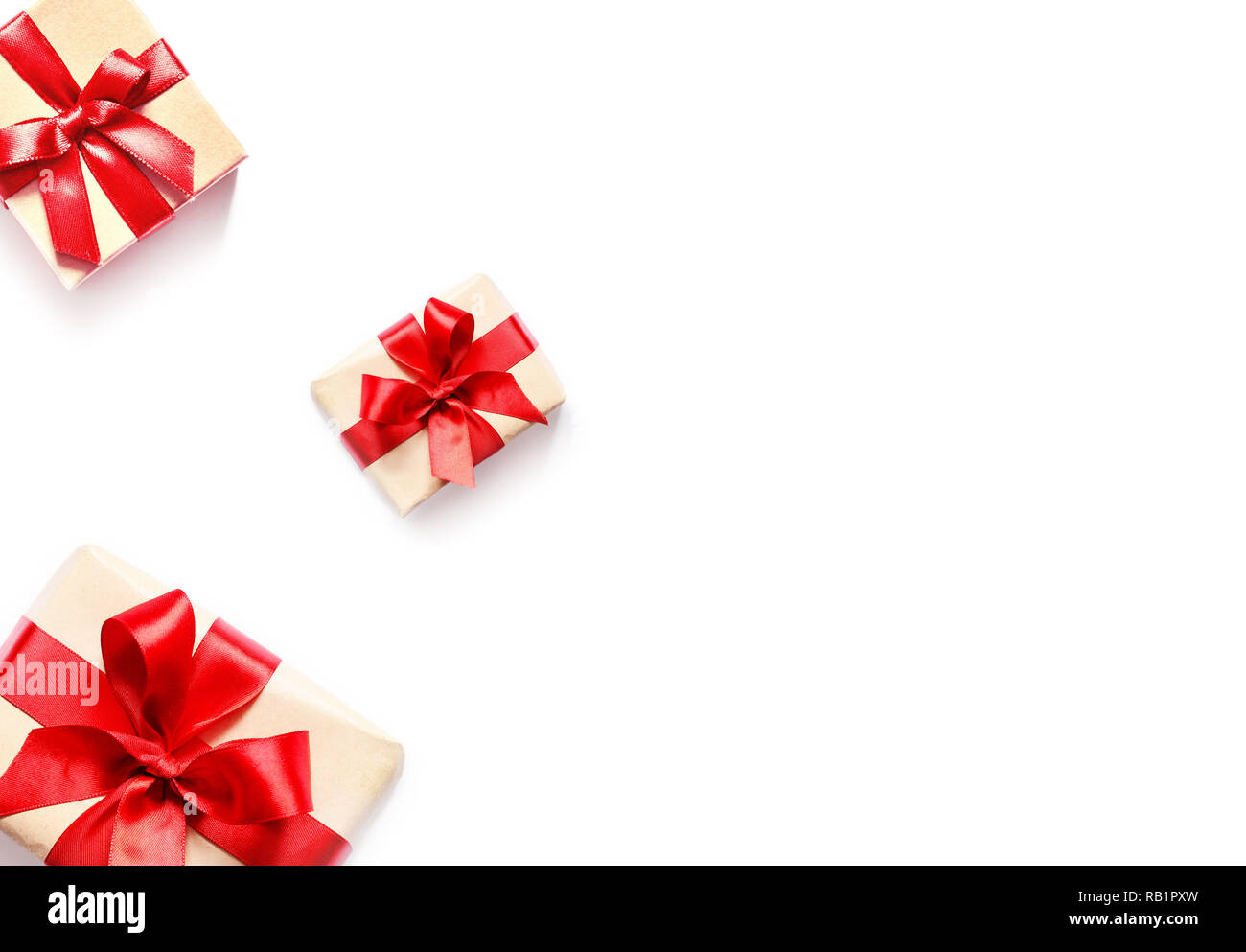 Gift box with red ribbon isolated on white Stock Photo - Alamy
