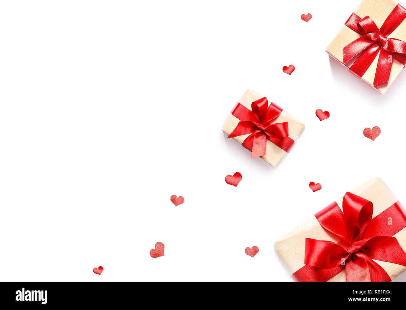 Gift box with red ribbon and heart on white background Stock Photo - Alamy
