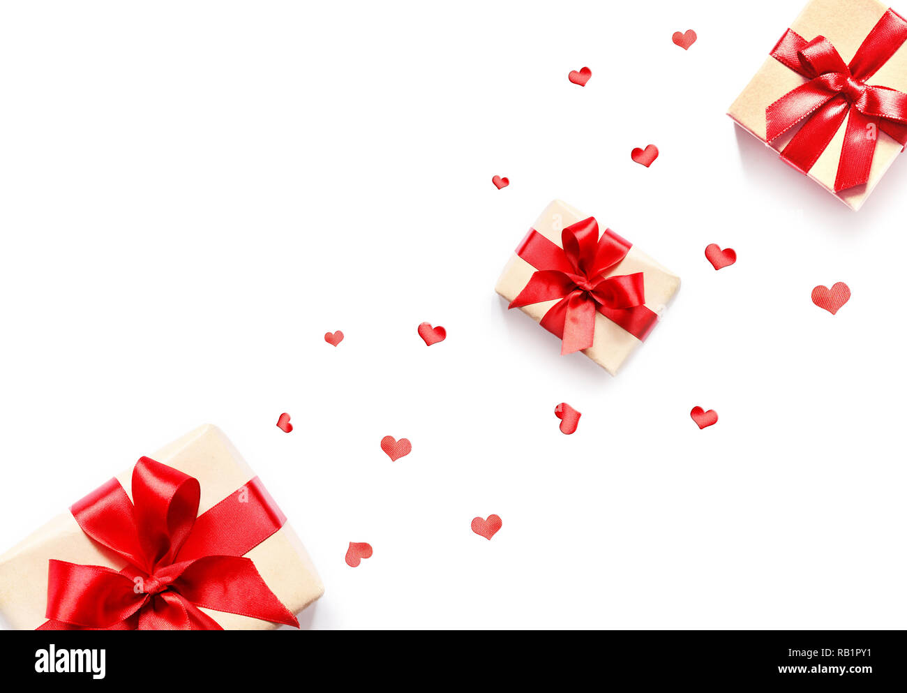 Gift box with red ribbon and heart on white background Stock Photo - Alamy