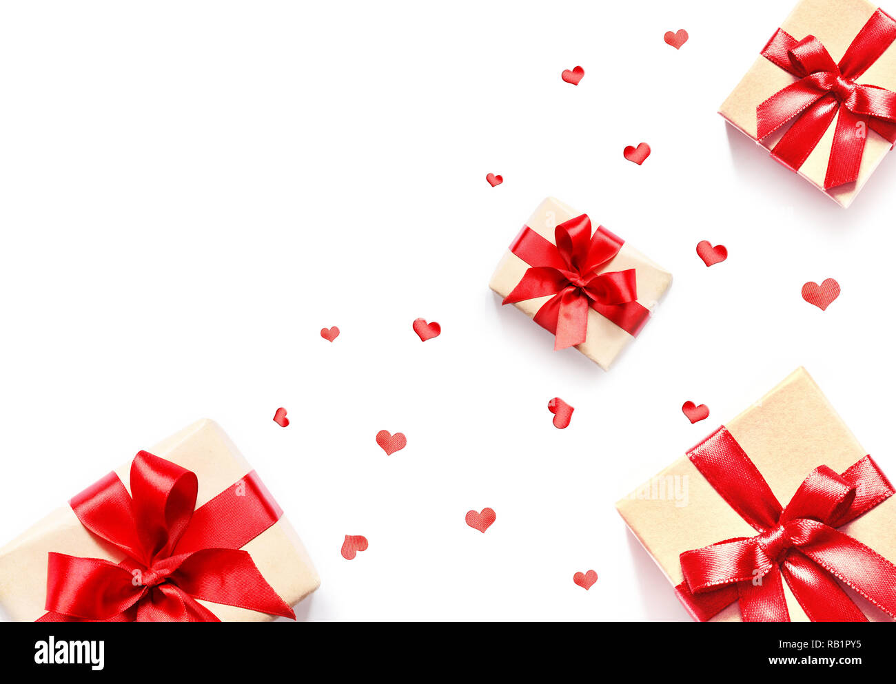 Gift box with red ribbon and heart on white background Stock Photo - Alamy