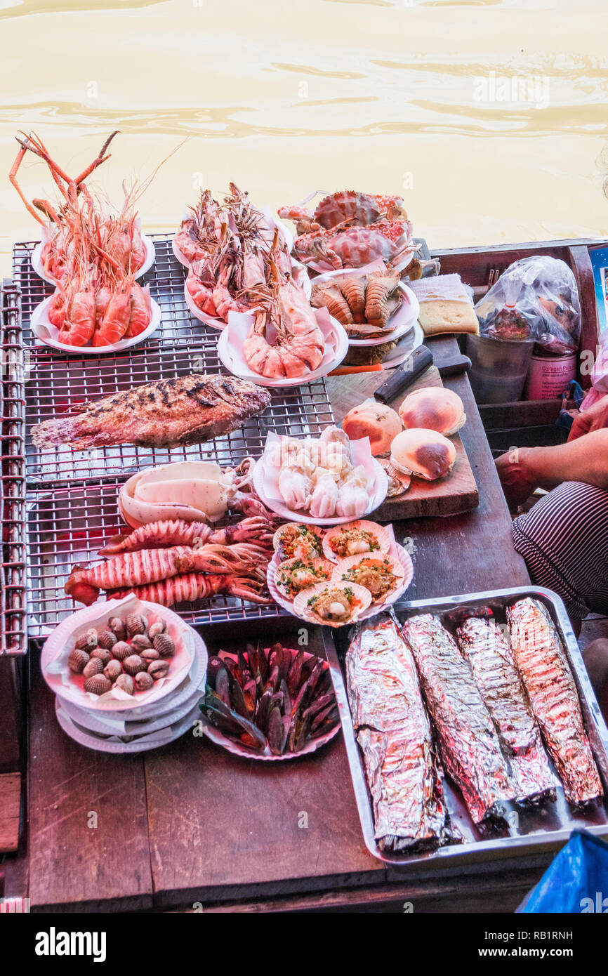 Barbecued seafood for sale at Amphawa floating market, Thailand Stock Photo