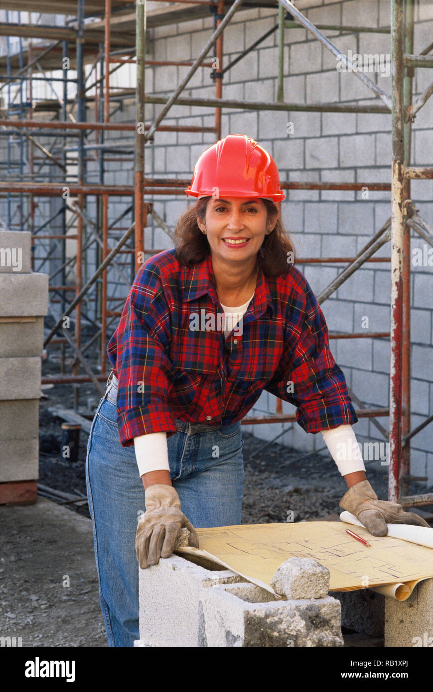 Female construction worker on site, USA Stock Photo