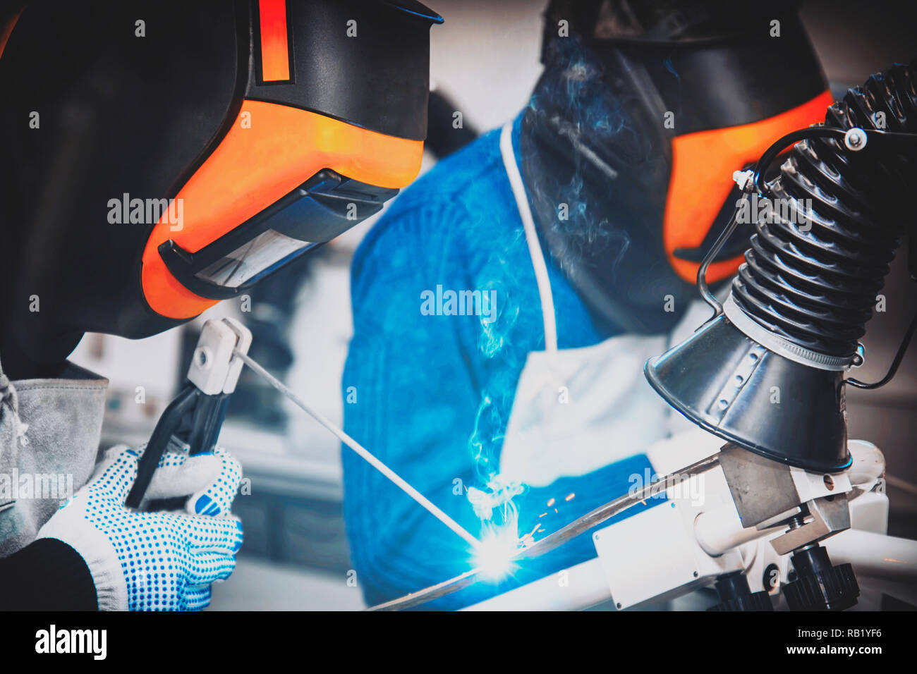 Welding and bright sparks. Hard job Stock Photo