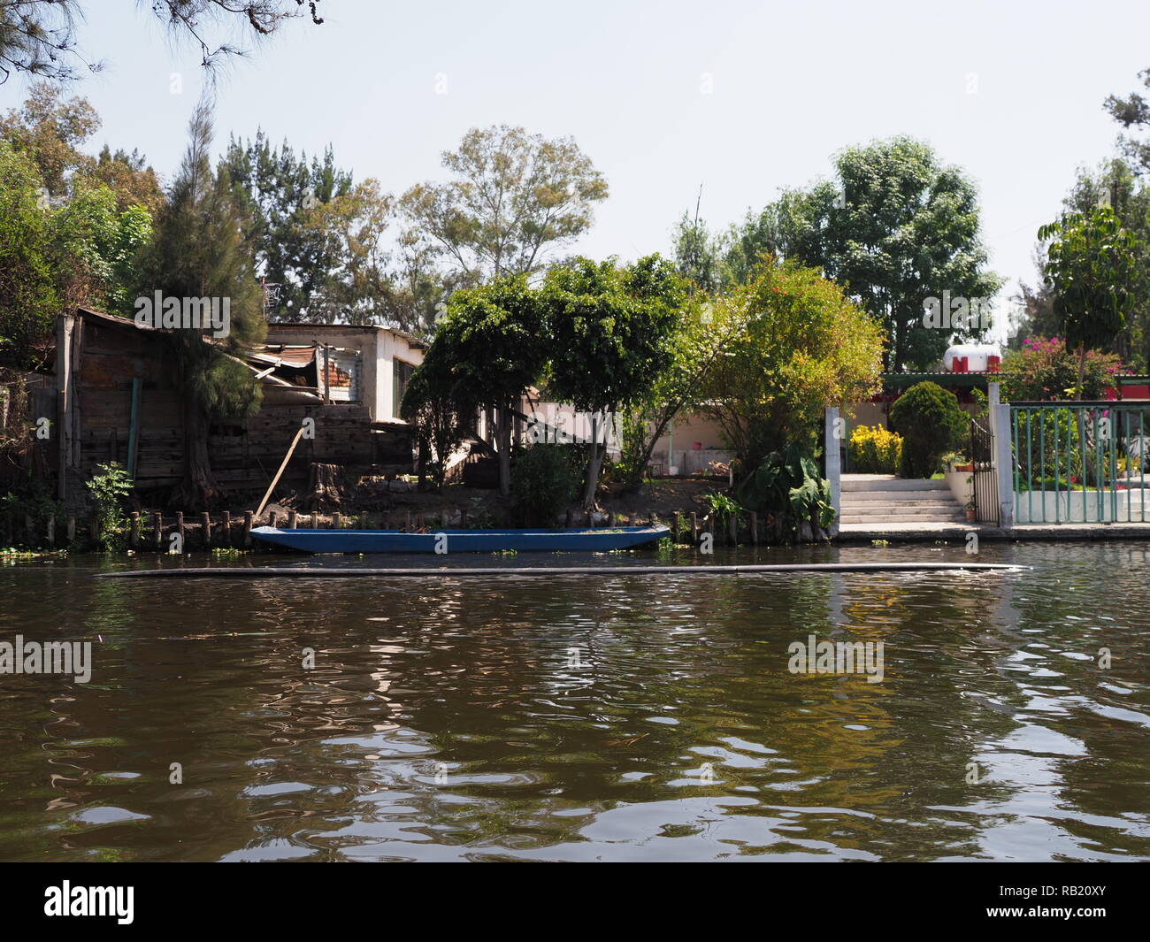 Blue boat at Xochimilco's Floating Gardens in Mexico Stock Photo Alamy