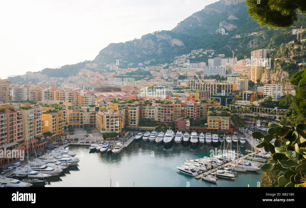 View from Le Rocher on the Marine Yacht Harbor in the Port of the Principality of Monaco, at the French Riveira. Stock Photo