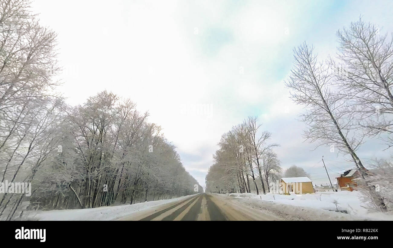 Country road in winter along the forest with white snow trees Stock ...
