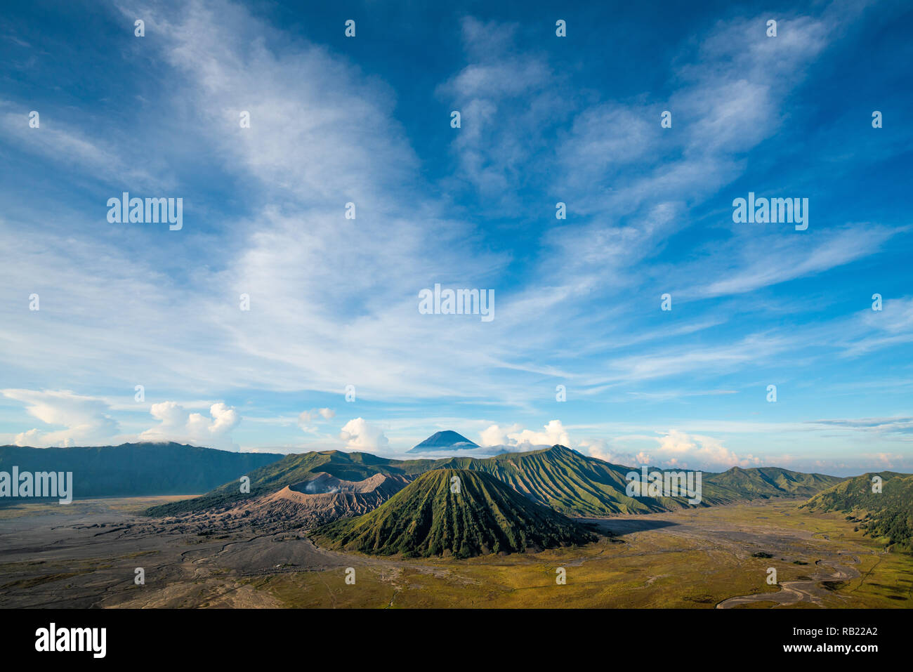 Bromo mountain , day time with dramatic cloud on blue sky Stock Photo
