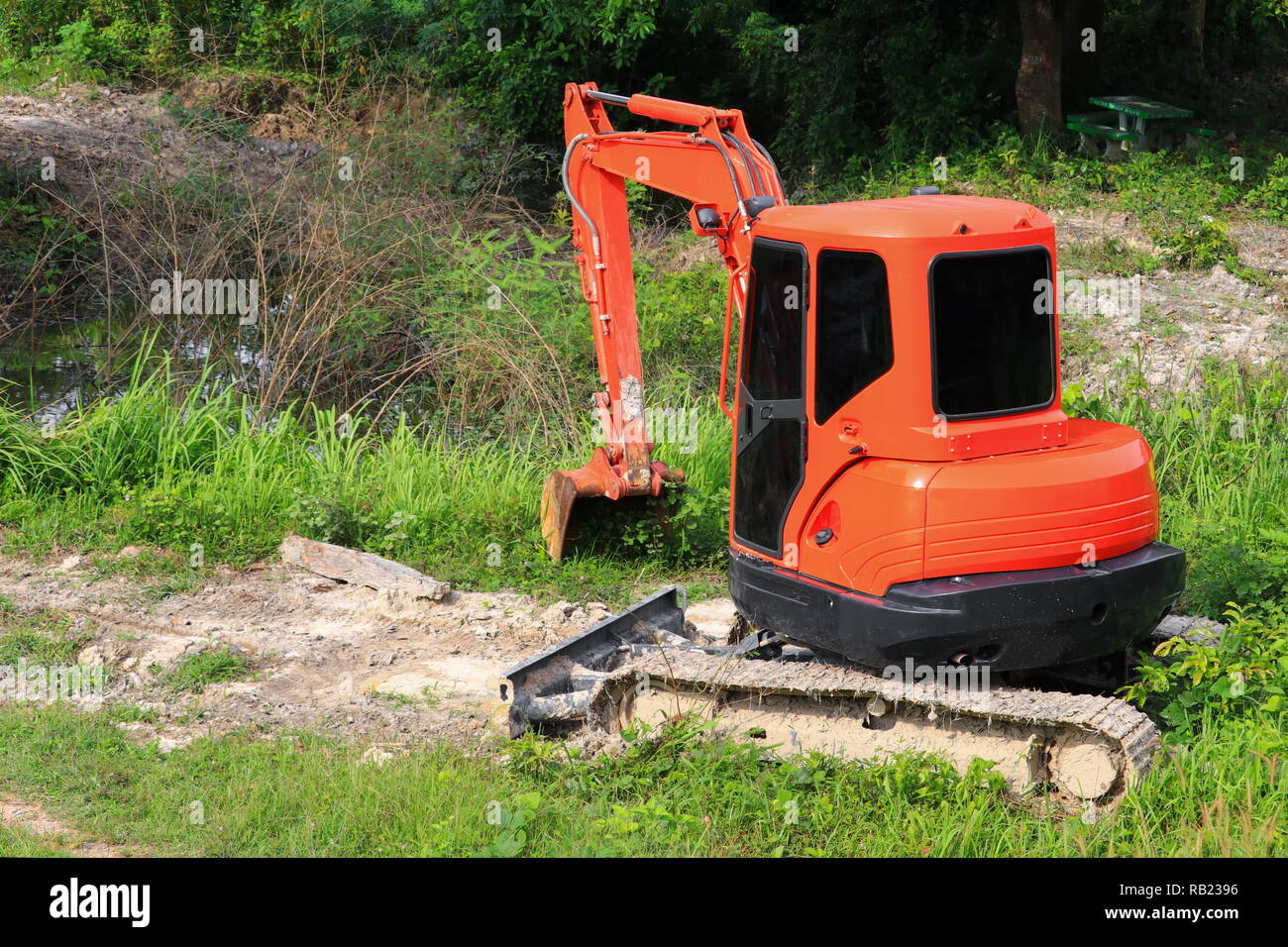 Crawler bucket small excavator bulldozer in working Stock Photo Alamy