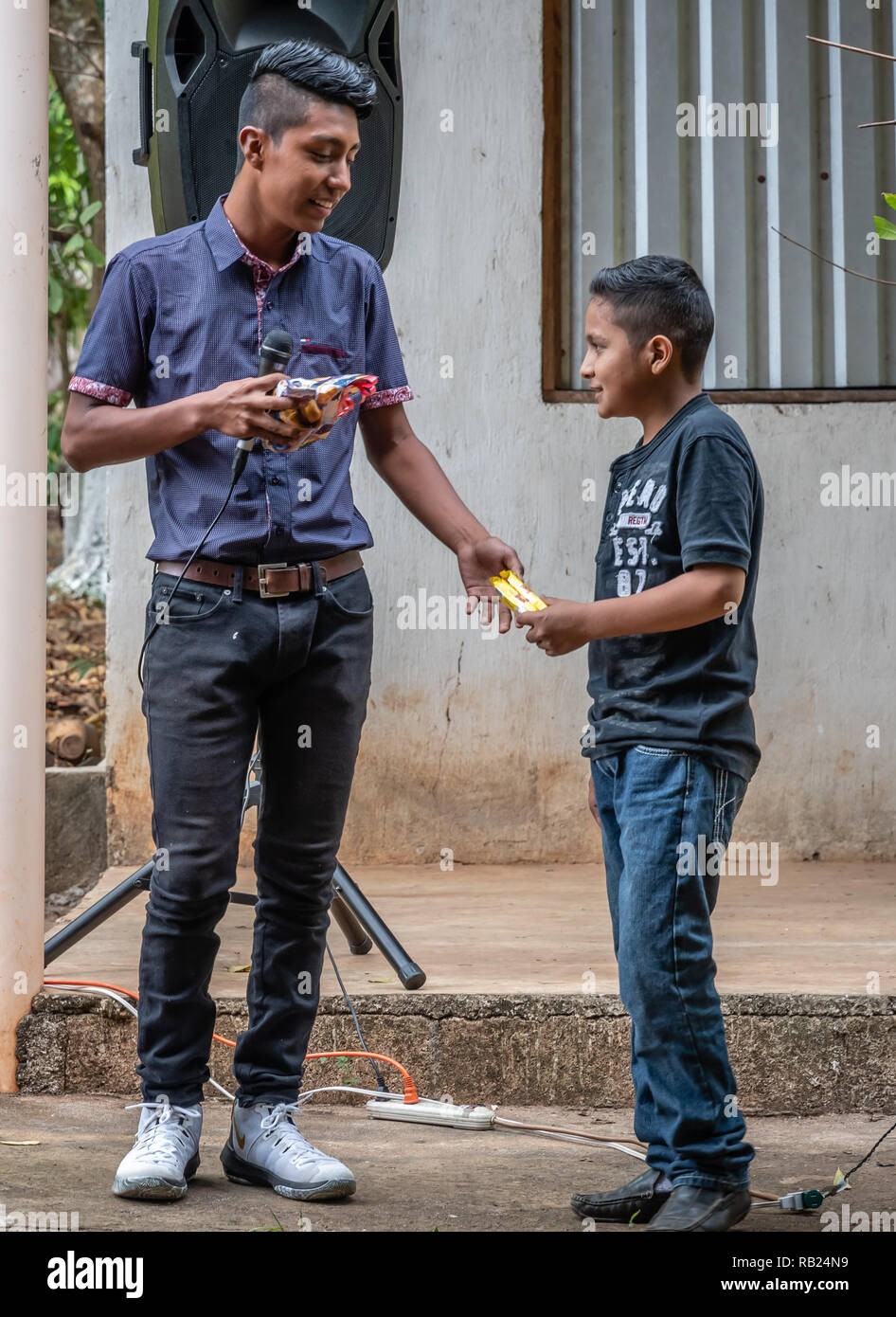 latin people with microphone at party in Guatemala Stock Photo Alamy