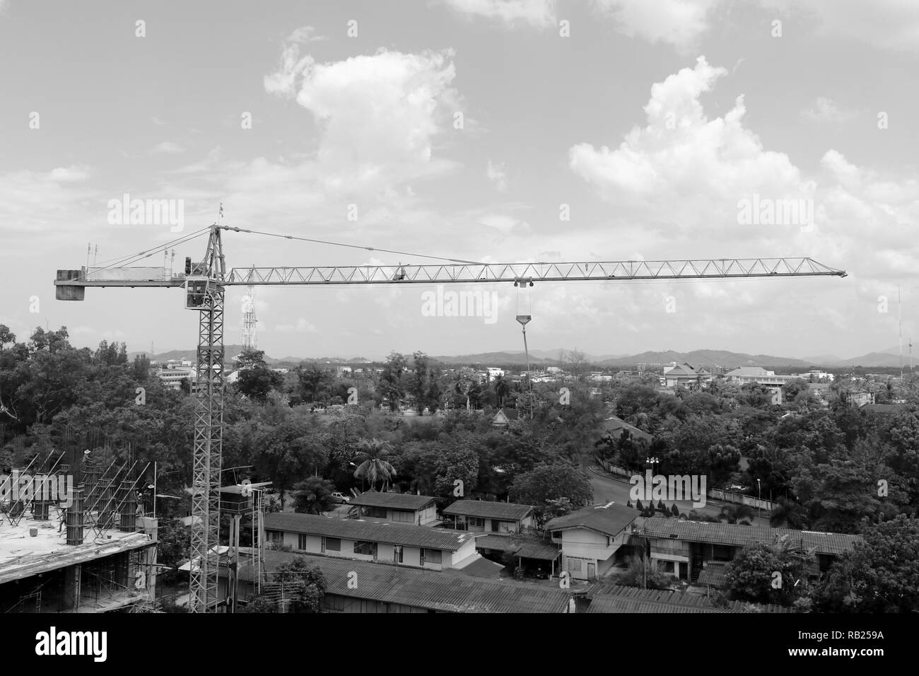 crane tower in construction building site. image black and white on sky ...