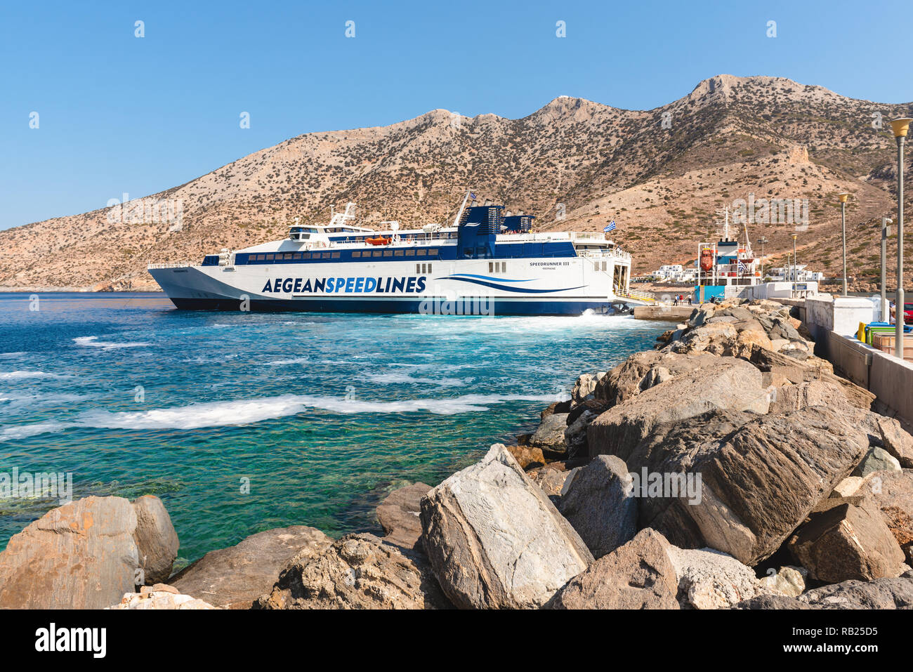 SIFNOS, GREECE - September 10, 2018: Speed Runner III ferry boat arrived at port of Kamaresi town in Sifnos Greece. Stock Photo