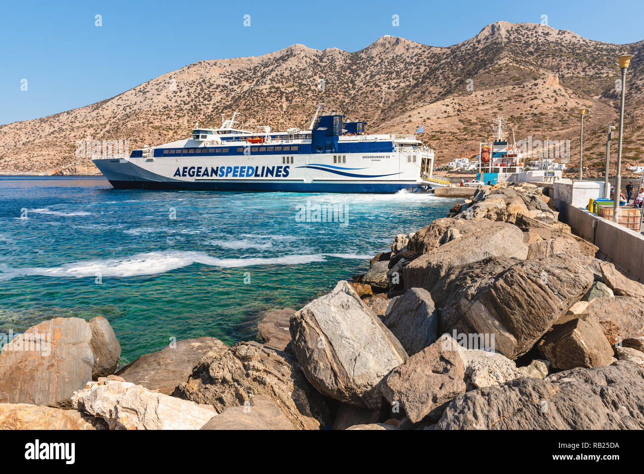 SIFNOS, GREECE - September 10, 2018: Speed Runner III ferry boat arrived at port of Kamaresi town in Sifnos Greece. Stock Photo