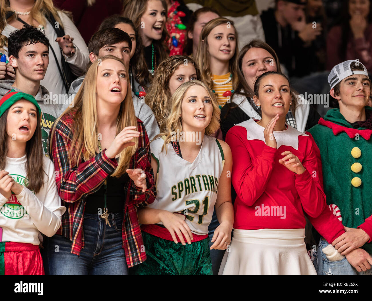 High school girls cheering during a basketball game in Red Bluff