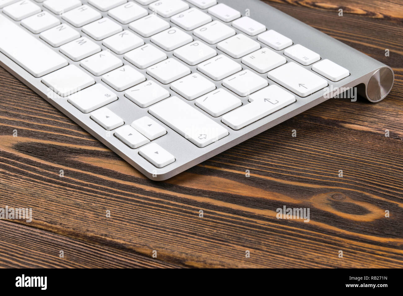 Close up view of a business workplace with wireless computer keyboard ...