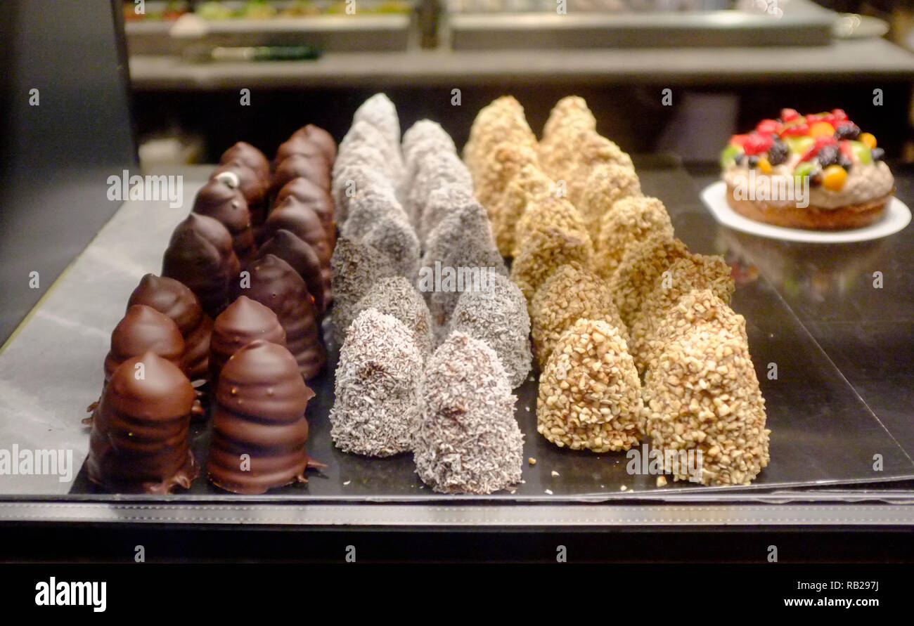 cakes and pasteries on display in the window of the danish bakery Ole & Steen, haymarket , london Stock Photo