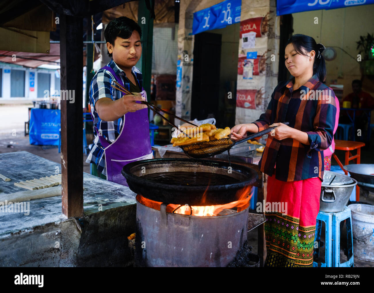 KYAING TONG, MYANMAR CIRCA DECEMBER 2017 Merchants close to the