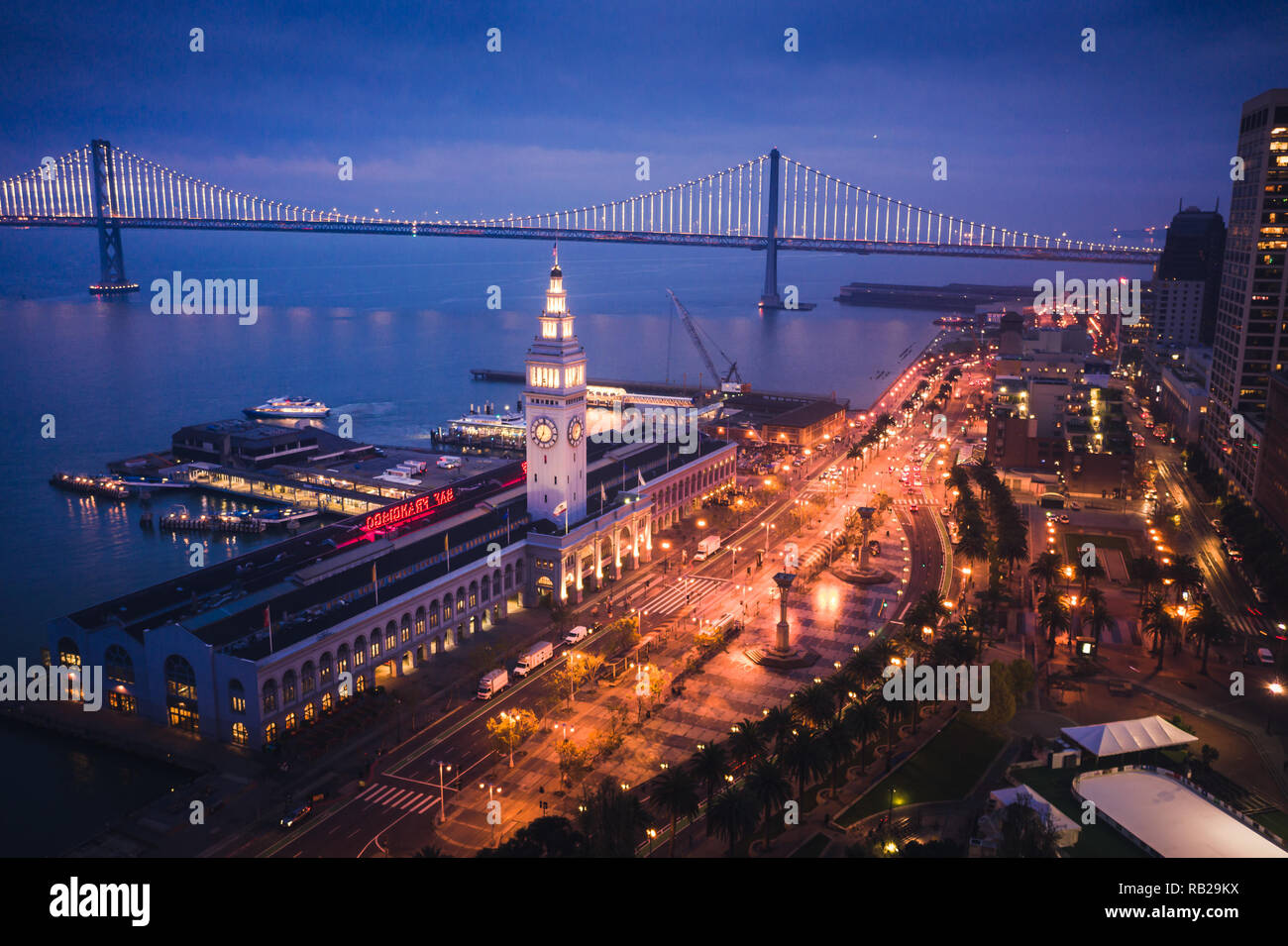 Aerial Cityscape View of San Francisco Ferry Building and Embarcadero at Dusk Stock Photo