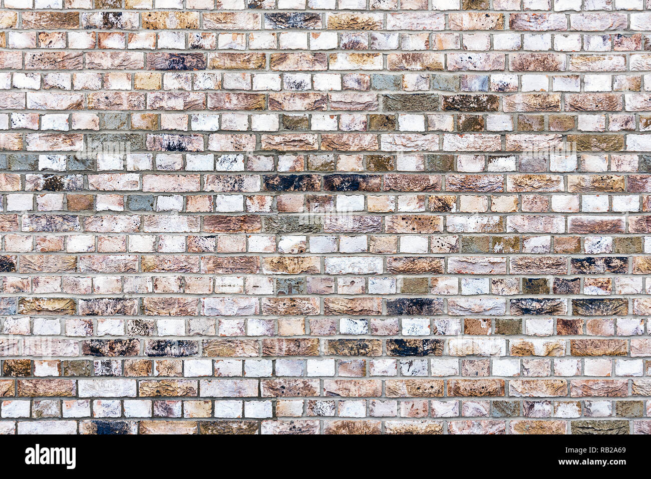 Background from a historic old stone wall Stock Photo