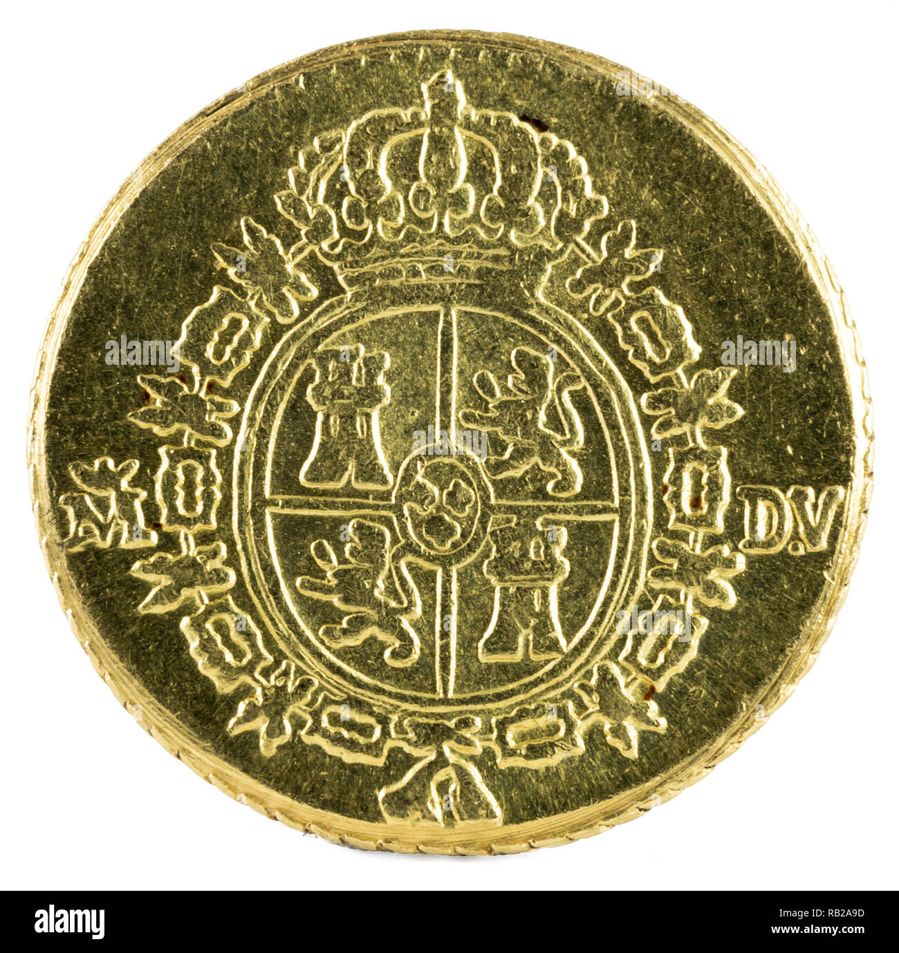 Ancient Spanish gold coin of King Carlos III. With a value of medio