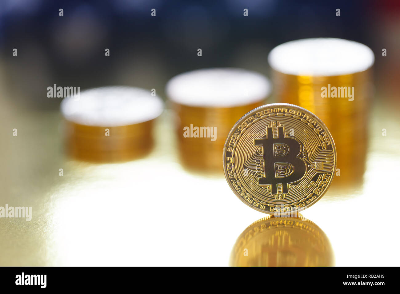 Golden Bitcoin on the flag of USA background Stock Photo
