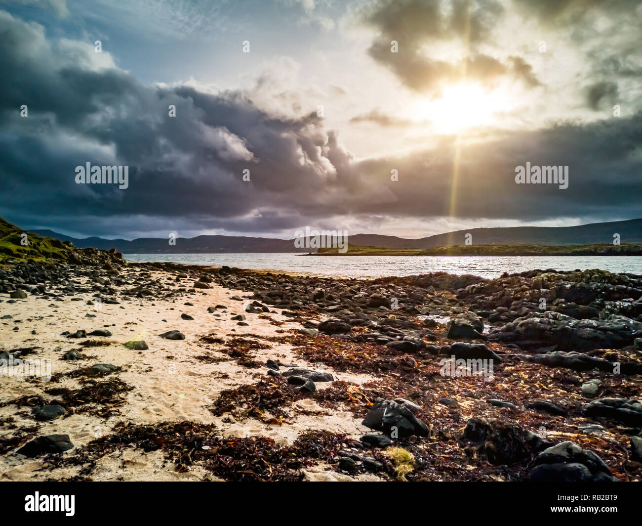 Dramatic sky at coral beach on the Isle of Skye island in Scotland - United Kingdom Stock Photo